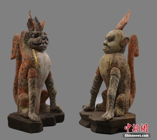 圖為慕容智墓出土鎮(zhèn)墓獸。 中新社發(fā) 甘肅省文物局 供圖